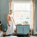 Man preparing for chest waxing for men at a professional salon