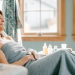 Confident woman in her 50s relaxing during a waxing appointment at Brazil's Waxing Center