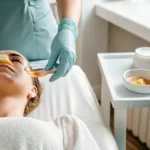 Woman getting a chin and lip wax from a professional esthetician in Gainesville.